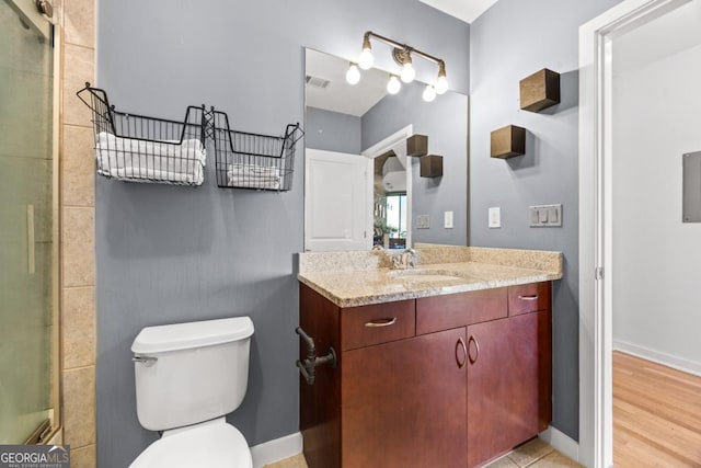 400 W Peachtree St NW Unit 3614, Atlanta, GA 30308 - full bathroom with visible vents, an enclosed shower, toilet, and vanity