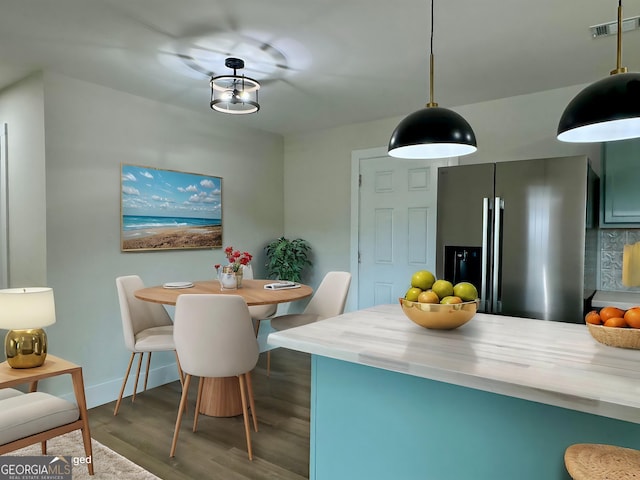 101 Newsome St, Union Point, GA 30669 - dining space featuring wood finished floors and baseboards
