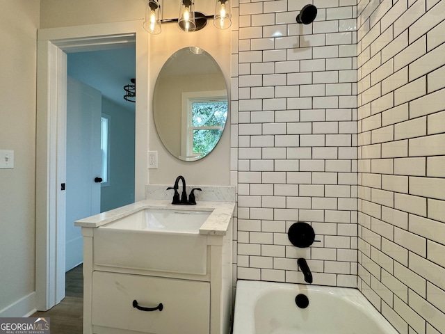 101 Newsome St, Union Point, GA 30669 - full bath featuring vanity, shower / bathtub combination, and wood finished floors