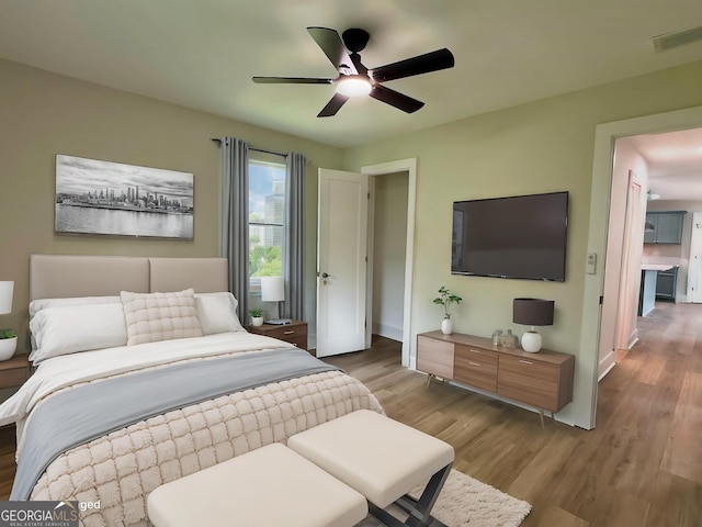 101 Newsome St, Union Point, GA 30669 - bedroom featuring wood finished floors, baseboards, and a ceiling fan