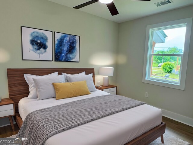 101 Newsome St, Union Point, GA 30669 - bedroom featuring wood finished floors, baseboards, and a ceiling fan