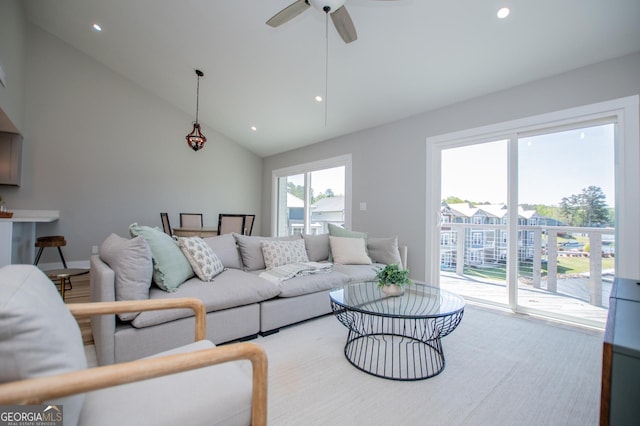 living room featuring recessed lighting, high vaulted ceiling, and a ceiling fan