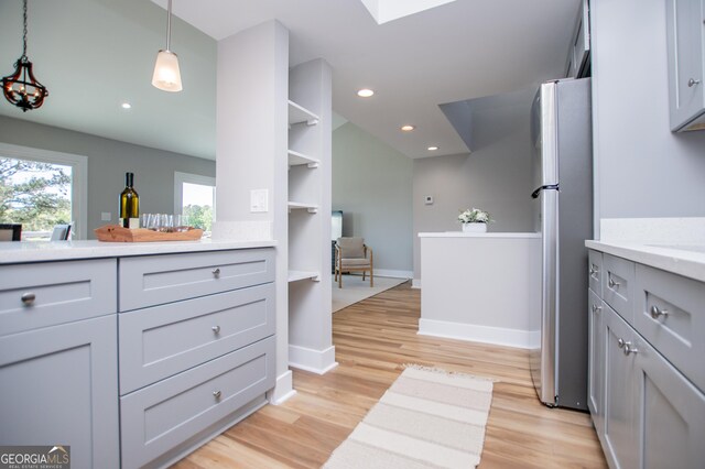 full bathroom with baseboards, recessed lighting, wood finished floors, and vanity