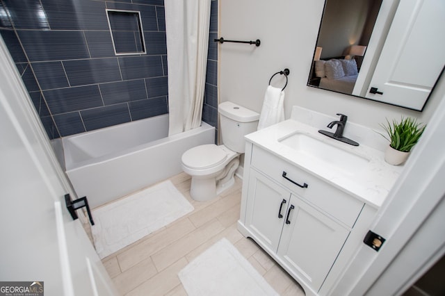 bathroom with toilet, shower / bath combination with curtain, tile patterned flooring, and vanity