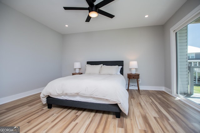 bedroom with light wood finished floors, recessed lighting, ceiling fan, and baseboards