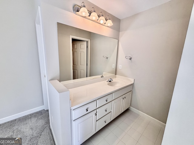 bathroom featuring vanity and baseboards