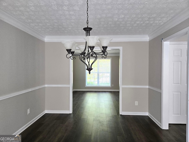 unfurnished dining area with a textured ceiling, an inviting chandelier, baseboards, and dark wood-type flooring