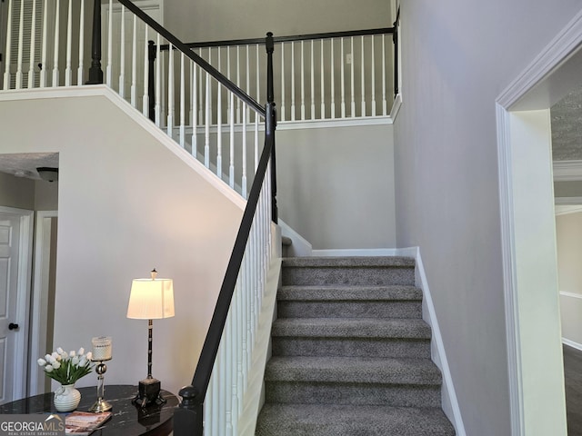 staircase with baseboards