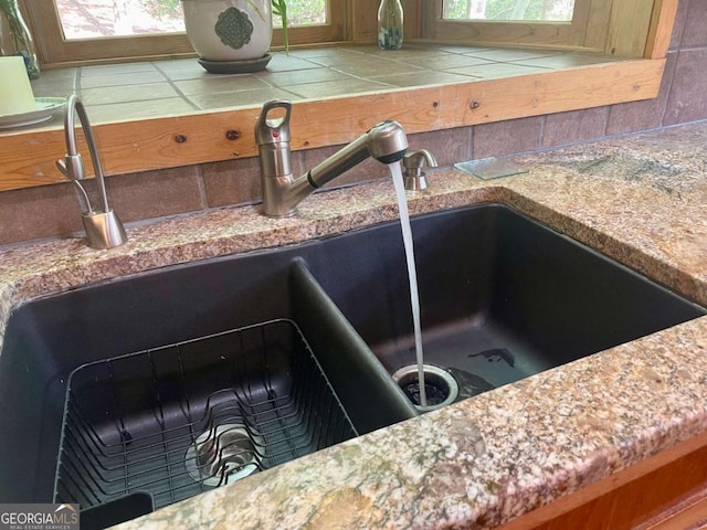 296 Fairview Ct, Jasper, GA 30143 - interior details with a sink and tasteful backsplash