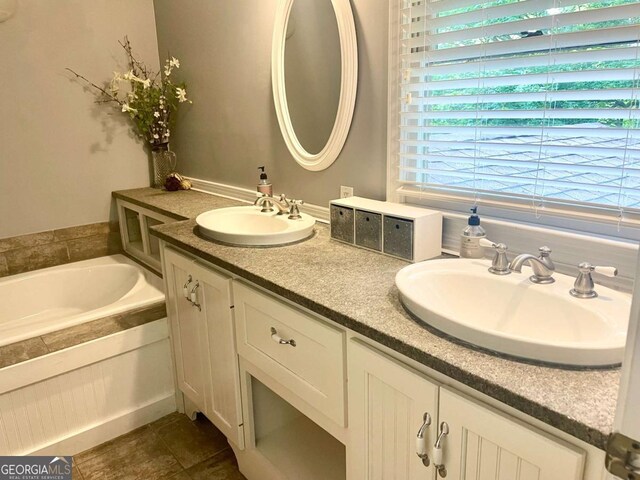 296 Fairview Ct, Jasper, GA 30143 - bathroom with double vanity, a sink, a bath, and tile patterned floors