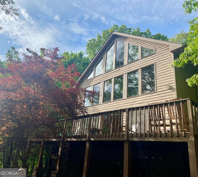 296 Fairview Ct, Jasper, GA 30143 - rear view of house featuring a wooden deck and an attached garage