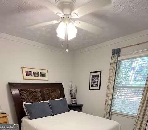 296 Fairview Ct, Jasper, GA 30143 - bedroom featuring a textured ceiling and ceiling fan
