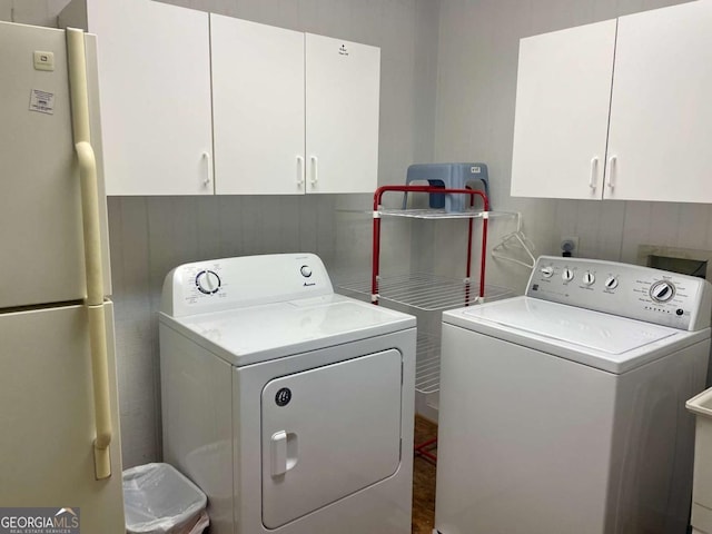 296 Fairview Ct, Jasper, GA 30143 - laundry room with washer and dryer and cabinet space