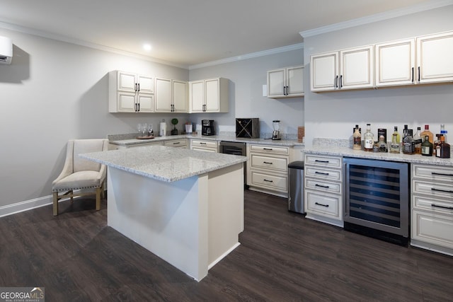 kitchen featuring crown molding, a center island, light stone countertops, dark wood finished floors, and wine cooler