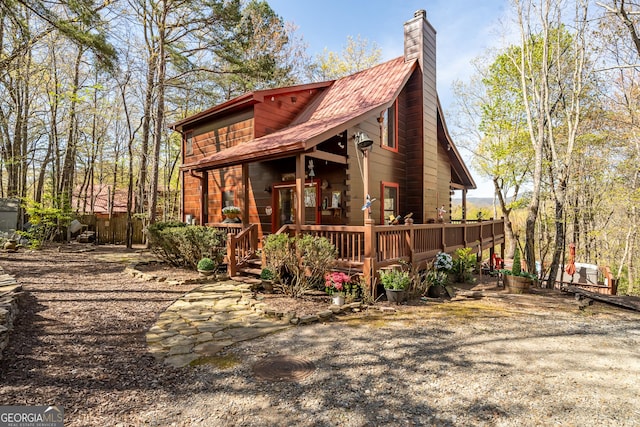 240 Lower Prince Mountain Rd, Cherry Log, GA 30522 - exterior space featuring a chimney, metal roof, and a wooden deck