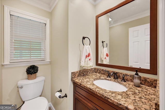 half bath featuring vanity, toilet, and crown molding