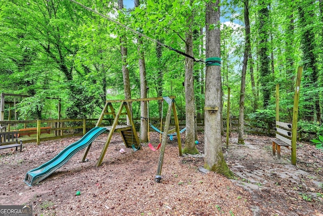 community play area featuring fence
