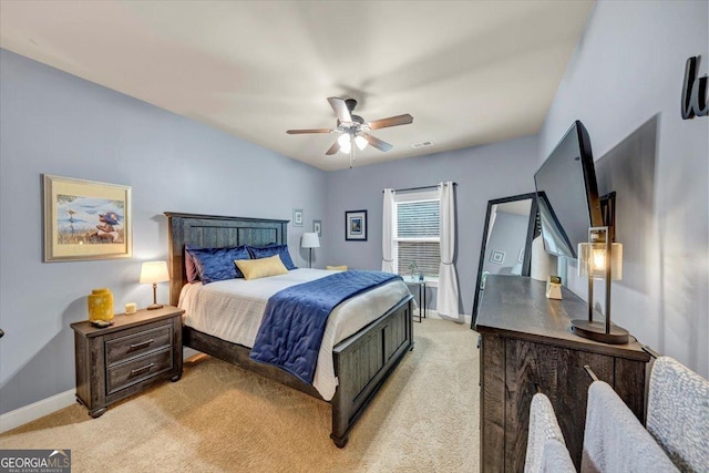 2376 Roberts View Trl, Buford, GA 30519 - bedroom with light colored carpet, visible vents, baseboards, and ceiling fan