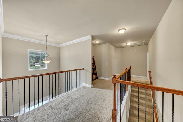 2376 Roberts View Trl, Buford, GA 30519 - hall with carpet, attic access, an upstairs landing, crown molding, and baseboards