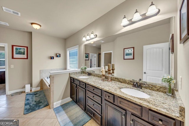 2376 Roberts View Trl, Buford, GA 30519 - full bathroom featuring a sink, double vanity, visible vents, and tile patterned floors