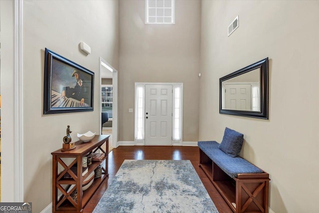 2376 Roberts View Trl, Buford, GA 30519 - entrance foyer with baseboards, dark wood-style flooring, visible vents, and a high ceiling