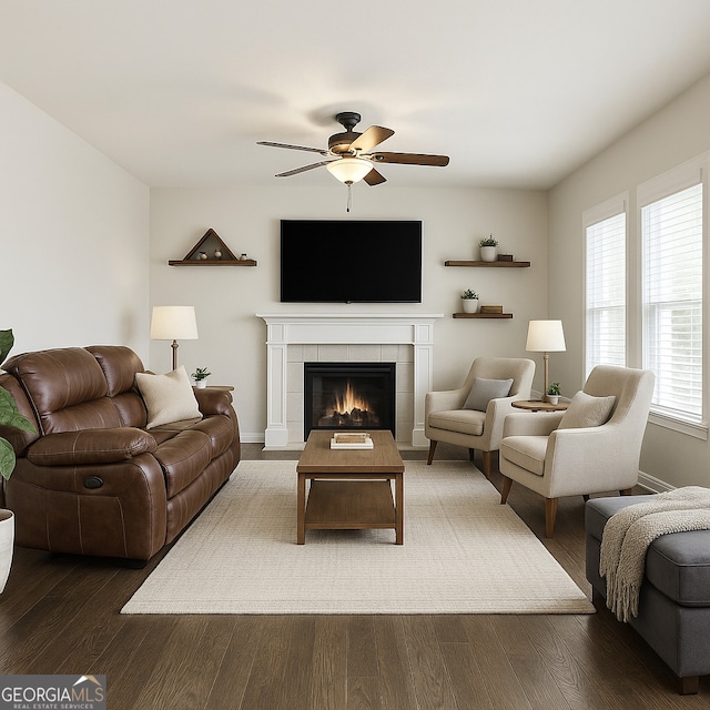97 Fieldstone Ln, Dallas, GA 30132 - living area featuring a ceiling fan, wood finished floors, a tile fireplace, and baseboards