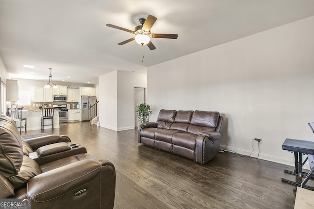 97 Fieldstone Ln, Dallas, GA 30132 - living area featuring ceiling fan, dark wood-style flooring, baseboards, recessed lighting, and stairs