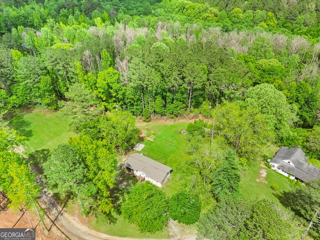 bird's eye view featuring a view of trees