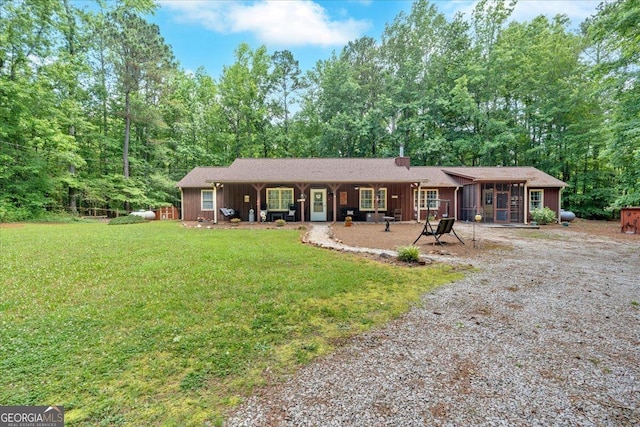712 Honeysuckle Ln, Temple, GA 30179 - view of front facade featuring a front lawn and a sunroom