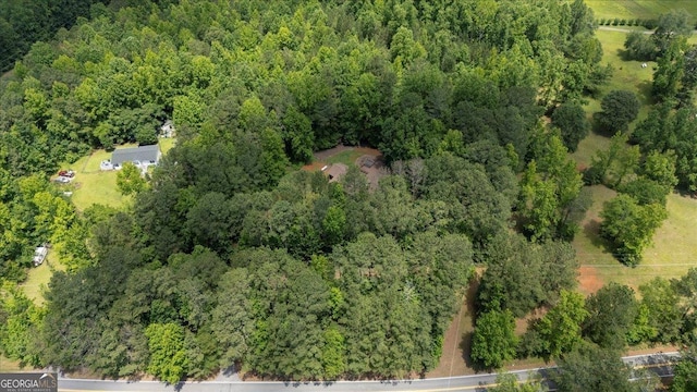 712 Honeysuckle Ln, Temple, GA 30179 - aerial view of property and surrounding area with a heavily wooded area