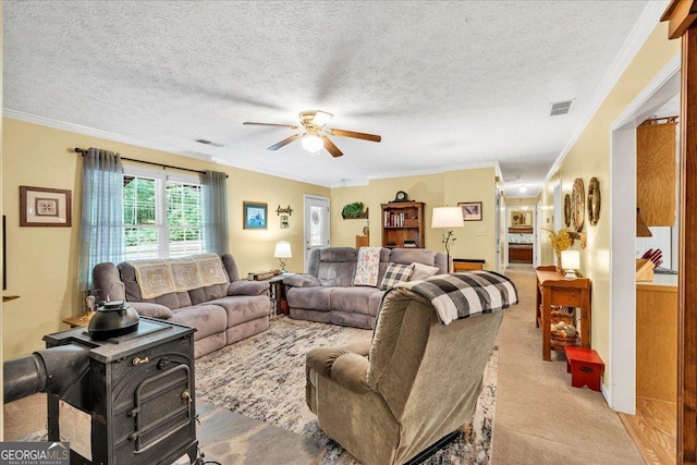 712 Honeysuckle Ln, Temple, GA 30179 - living room featuring a ceiling fan, ornamental molding, light carpet, and a textured ceiling