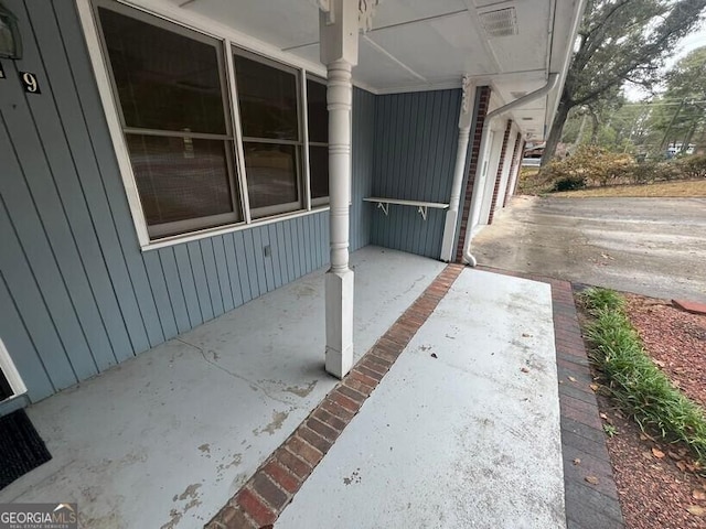 view of patio featuring a porch