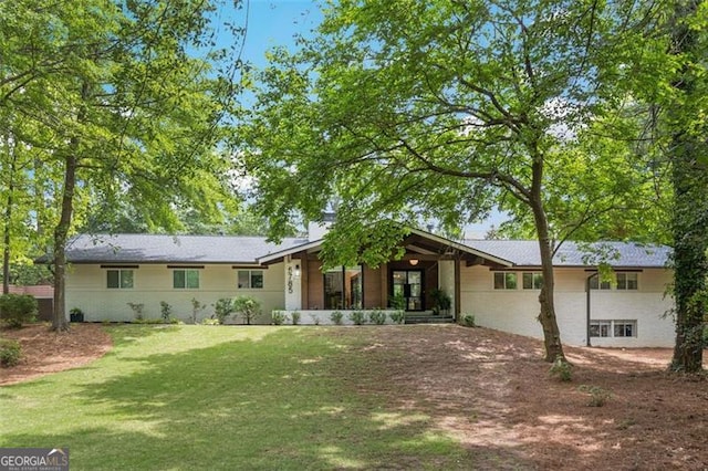 5785 Timberlane Ter, Sandy Springs, GA 30328 - rear view of house with a yard