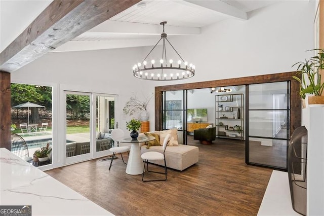 5785 Timberlane Ter, Sandy Springs, GA 30328 - dining area with a high ceiling, wood finished floors, a notable chandelier, and beam ceiling
