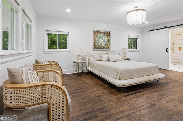 5785 Timberlane Ter, Sandy Springs, GA 30328 - bedroom with multiple windows, dark wood-style flooring, and a barn door