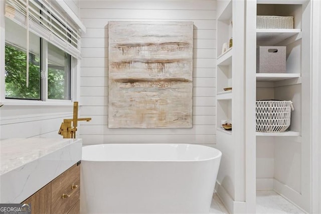 5785 Timberlane Ter, Sandy Springs, GA 30328 - bathroom featuring wooden walls and a freestanding tub