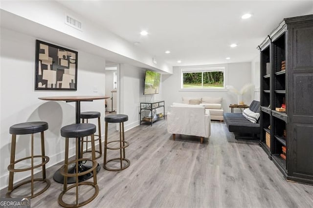 5785 Timberlane Ter, Sandy Springs, GA 30328 - living area featuring light wood-style floors, baseboards, and recessed lighting