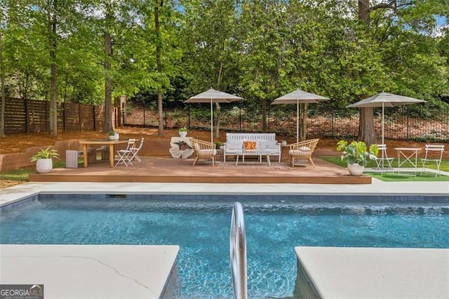 5785 Timberlane Ter, Sandy Springs, GA 30328 - view of swimming pool featuring a fenced in pool, a wooden deck, and fence