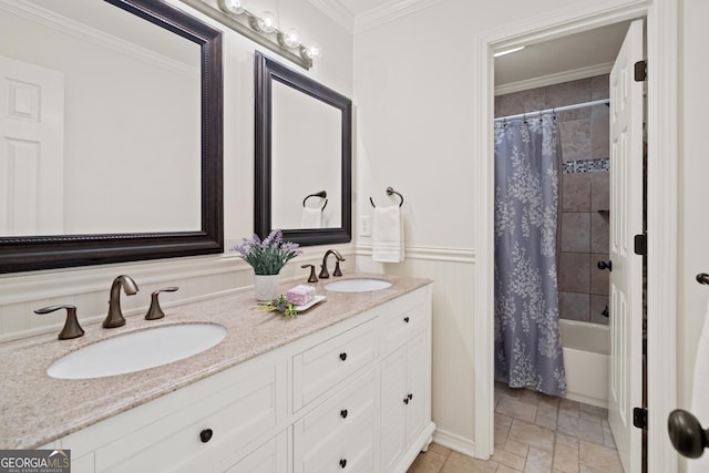full bath featuring double vanity, a sink, stone finish flooring, and shower / bathtub combination with curtain