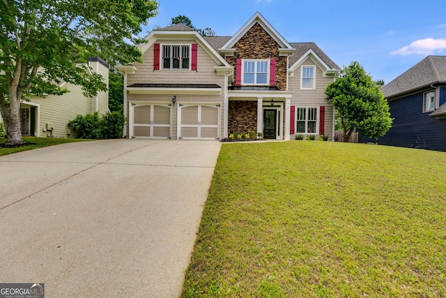 36 Evergreen Way, Dallas, GA 30157 - craftsman house with stone siding, a garage, driveway, and a front yard