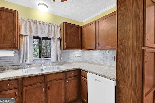kitchen with dishwasher, a sink, tasteful backsplash, a textured ceiling, and light countertops