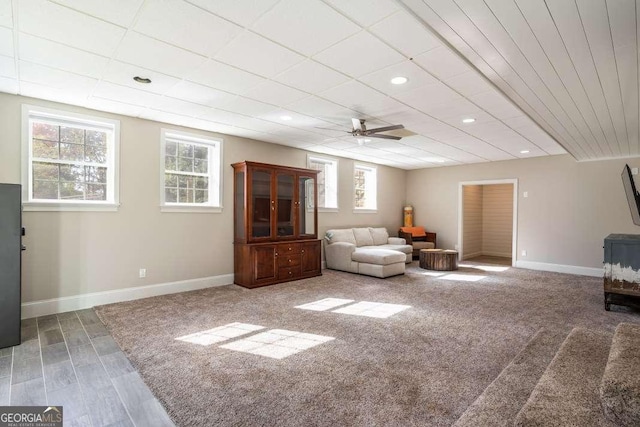 living area featuring recessed lighting, baseboards, ceiling fan, and wood finished floors