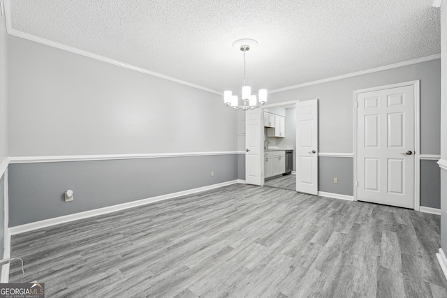 2930 Parc Lorraine, Lithonia, GA 30038 - kitchen featuring appliances with stainless steel finishes, a sink, light countertops, light wood-style floors, and white cabinetry