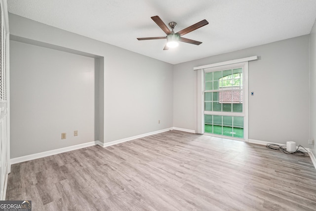 2930 Parc Lorraine, Lithonia, GA 30038 - unfurnished bedroom with baseboards, light wood finished floors, and visible vents