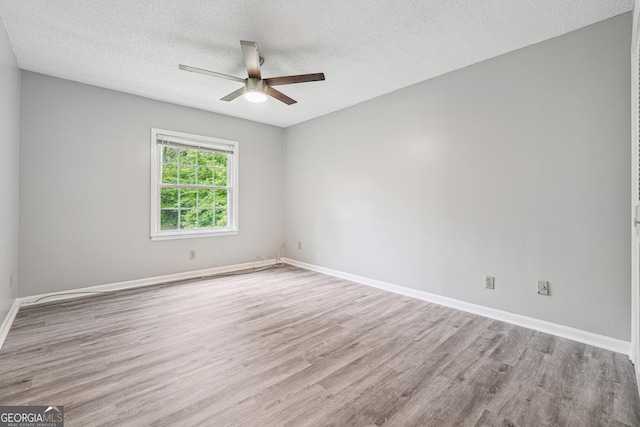 2930 Parc Lorraine, Lithonia, GA 30038 - unfurnished bedroom featuring ceiling fan, light wood-style floors, baseboards, visible vents, and a closet