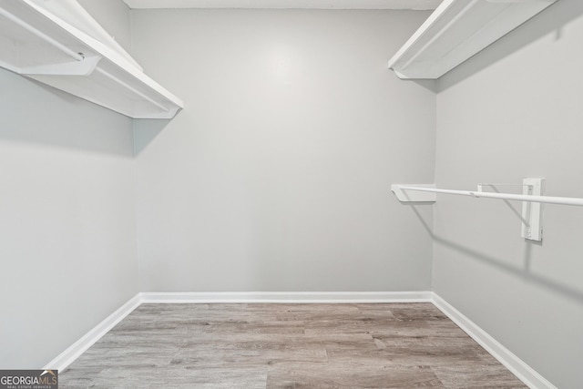 2930 Parc Lorraine, Lithonia, GA 30038 - hallway featuring carpet floors, arched walkways, and baseboards