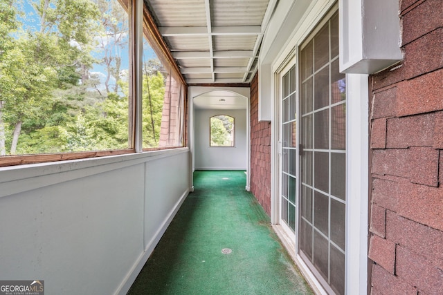 2930 Parc Lorraine, Lithonia, GA 30038 - hallway featuring carpet floors, arched walkways, and baseboards