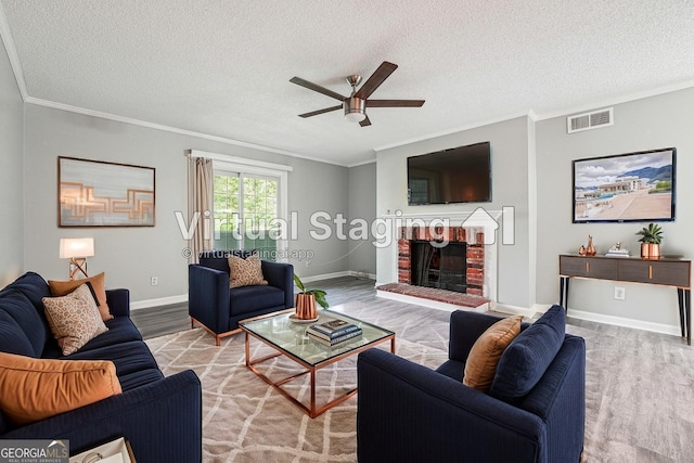 2930 Parc Lorraine, Lithonia, GA 30038 - unfurnished living room featuring a ceiling fan, a textured ceiling, visible vents, and wood finished floors