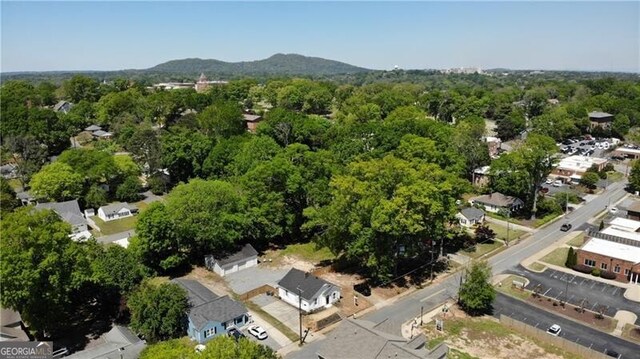 130 S Avenue SE, Marietta, GA 30060 - birds eye view of property featuring a wooded view