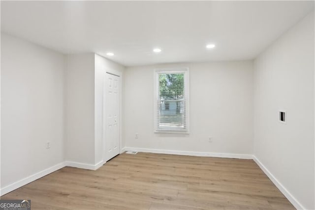 130 S Avenue SE, Marietta, GA 30060 - spare room featuring recessed lighting, baseboards, and light wood-style flooring
